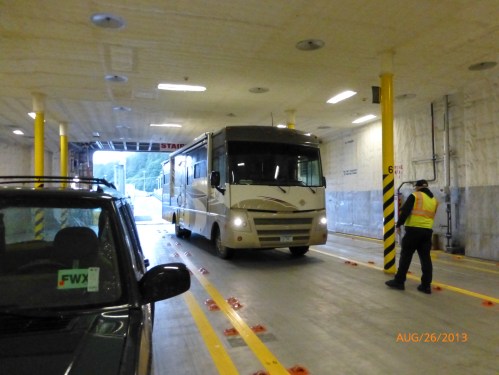A Deckhand Guides Bernie Into the Car Deck